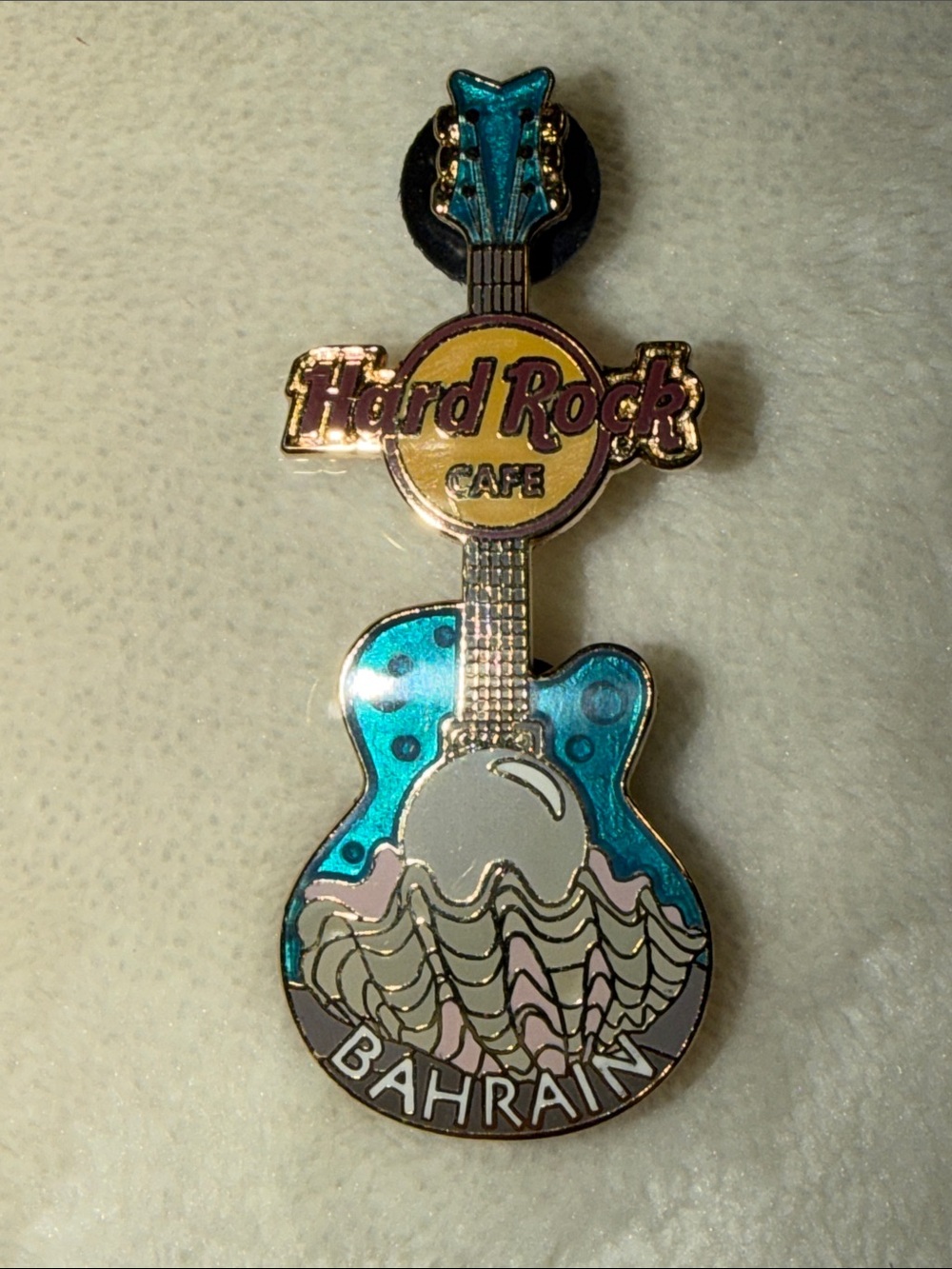 Hard Rock Cafe Blue and Yellow Bahrain Guitar Pin with Oyster Shell